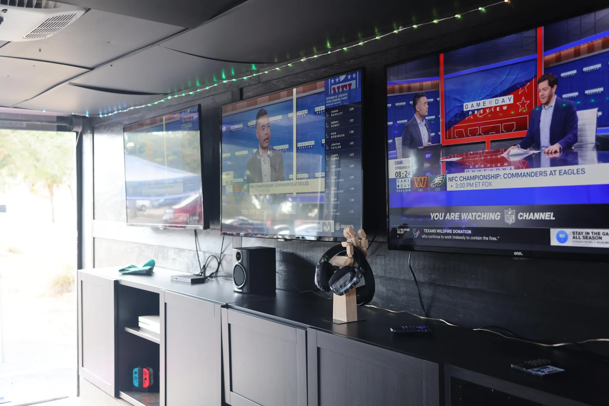 Two screens with Nintendo Switch setup
